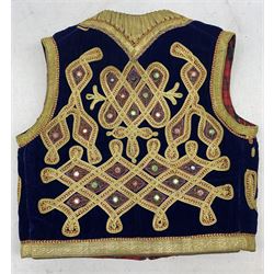 Afghan needlework waistcoat, circa. 1970, in blue velvet with gold and red applied decoration, with tartan lining, L50cm x W45cm
