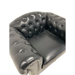 Chesterfield style club armchair, upholstered and buttoned in black with stud work