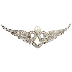 Early 20th century gold and silver winged heart brooch, set with rose cut diamonds and a single pearl