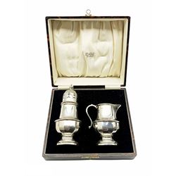 Silver vase shape sugar castor with pierced cover H16cm and matching cream jug Birmingham 1932 Maker William Neale in a Fattorini box 7.5oz