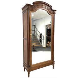 20th century French walnut armoire, the gadroon carved shaped top over bay leaf garland, bevelled door enclosed by two acanthus carved fluted columns, the birds eye maple and oak interior fitted with hanging rail and drawer, inlaid with lozenge parquetry work and mounted by carved flower head roundels, on turned and fluted feet