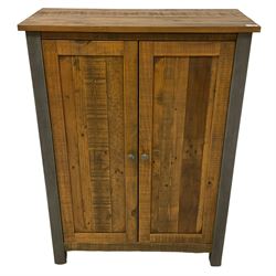 Rustic pine and metal two-door shoe cupboard, the interior fitted with sloped shoe compartments 