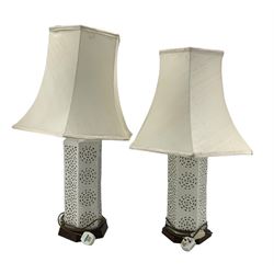 Pair of modern pierced pottery electric table lamps and shades with interior lighting H45cm excluding shade