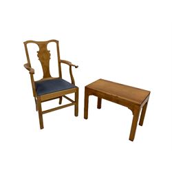 Oak carver chair by Shakleton of Snainton, the shaped cresting rail and splat, with scrolled arms over seat upholstered in blue fabric raised on squared supports, together with coffee table