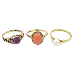 Gold single stone coral ring, pearl ring and a cabochon amethyst ring, all 9ct hallmarked or tested