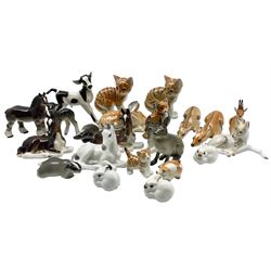 Collection of USSR Lomonosov figurines comprising horses, calf, cats, fallow deer, badger etc. 
