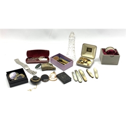 Five early 20th century silver and mother-of-pearl fruit knives, 19th vulcanite vesta case, 19th century vesta in the form of an eagle, various brooches, shell carved cameo pendant, Trench art type lighter in the form of a bullet, another with coins inset, lipstick form lighter and miscellanea in one box