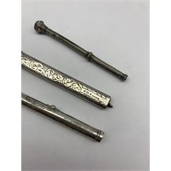 Edwardian silver pencil holder having foliate engraved design, Birmingham 1901, together with two 19th/ early 20th century white metal propelling pencils (3)