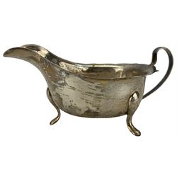 Silver sauce boat with crimped rim and triple supports Sheffield 1959 Maker Viners Ltd  