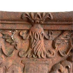Three sets of cast iron square column capitals or collars, four-piece concaved square form decorated with anthemion motifs and central urn 