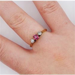 Early 20th century 18ct gold three stone pink topaz and old cut diamond ring, stamped