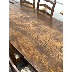 Large solid elm refectory style dining table, the serpentine top raised on shaped panel end supports united by pegged stretcher (183cm x 88cm, H75cm) together with a set of eight (6+2) ladder back dining chairs 