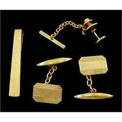 Pair of gold engine turned cufflinks, gold engine turned tie slide, both hallmarked 9ct and a gilt metal tie pin