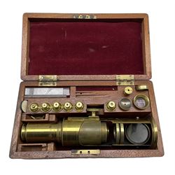 Brass field microscope in mahogany box with various accessories W28cm