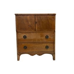 George III mahogany converted night-cabinet commode, rectangular top over two crossbanded cupboard doors and boxwood stringing, two drawers to base with ring handles and satinwood escutcheons, shaped apron