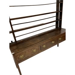 18th century oak dresser with three height plate rack, three frieze drawers with mahogany cross-bands, raised on square tapering supports 