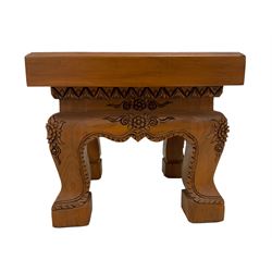 Hardwood occasional table, the square top carved with elephants and trees in a wild landscape, the shaped apron carved with extending foliate decoration, raised on cabriole supports