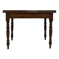 Victorian mahogany fold over tea table, the fold over top raised on turned supports 