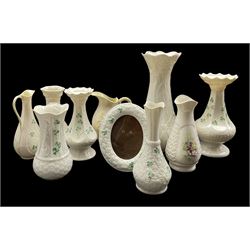 Modern Belleek leaf pattern vase H27cm, various other Belleek vases , oval frame etc and a Donegal vase (10)