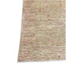 Pale ground wool rug, decorated with five rows of three contrasting square panels to field 