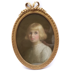 Bell (Early 20th century): Portrait of a Young Girl, oval pastel indistinctly signed and dated 1916, 51cm x 39cm