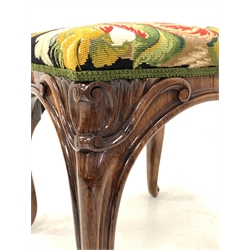 Early Victorian solid rosewood stool, floral needlework upholstered seat, raised on scroll carved cabriole supports 