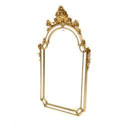 Regency style gold painted wall mirror, surmounted by a shell and floral pediment, 62cm x 115cm