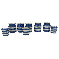 Five T G Green Cornish ware storage jars, Currants, Sugar, Raisins, Tapioca and Rice H16cm, two smaller jars Cocoa-Nut and Ground Rice and a jug (8)