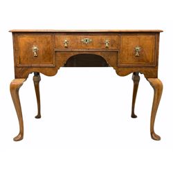 Queen Anne style walnut lowboy, the top with herringbone inlay and moulded edge over three oak lined drawers and a shaped apron, raised on cabriole supports