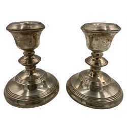 Pair of silver dressing table candlesticks with cushion knop stems and circular bases H12cm Birmingham 1987 Maker Broadway & Co 