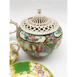 Early 20th century German porcelain figure of a figure of a woman protecting a nest of chicks from a cat, Mintons Green Cockatrice pattern tea wares, comprising teapot, tea cup, four saucers, sugar bowl and milk jug, together with a 19th/ early 20th century Canton jar, with matching pierced cover 