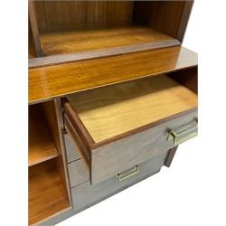 G-plan - teak bookcase on chest, the bookcase fitted with one fixed shelf over four drawers and one cupboard door, opening to reveal one shelf, raised on a plinth base 