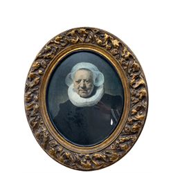 After Rembrandt van Rijn (Dutch 1606–1669): 'Portrait of Aechje Claesdr', colour print housed in oval gilt frame 45cm x 36cm