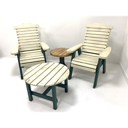 Two painted hardwood garden seats (W79cm) and a matching table (D71cm)