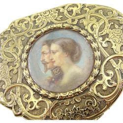 Mid 19th century continental gold box of lobed design with chased scroll and foliate decoration, the hinged cover inset with a circular miniature portrait of Napoleon III and Empress Eugenie signed 'Passot' 8.5cm x 6.5cm x 2cm. The box is not marked but tests as 18ct. Napoleon III (1808-1873) was Emperor from 1852 to 1870 and thereafter lived in exile in England. Napoleon and his wife Eugenie are buried in Hampshire.
An historically important example of a gold box with enamel and diamonds by Marital Bernard inset with a portrait of Napoleon III by Passot was sold by Dreweatts Auctioneers in 2008 for £18500