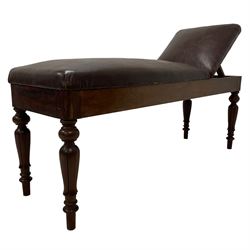 Victorian mahogany physician's examination table or medical couch, the adjustable headrest and sprung seat upholstered in chocolate brown leather, raised on turned and tapering lappet carved supports 