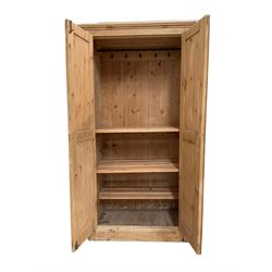 Pine wardrobe, two doors opening to reveal hanging rail and three fixed shelves W99cm, H194cm, D66cm 