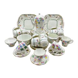Late 1930's Heathcote China coffee set for five, together with an Atlas China tea service for twelve settings 