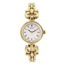 Seiko 9ct gold ladies quartz wristwatch, on 9ct gold bracelet, Birmingham 1998