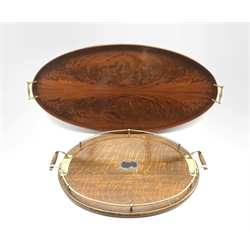  20th century figured mahogany oval tray with brass handles L82cm and an oak oval tray with plated mounts L59cm
