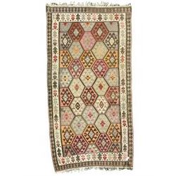 Kilim rug, in pale shades with overall geometric design 