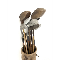 Bag of Hickory shafted and other golf clubs, Somerset Light Infantry silver topped swagger stick inscribed '119912 C R Hughes' and an ebonised evening cane 