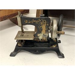 Children's German tin-plate sewing machine, dolls cradle and a 'Little Buffer' seat (3)