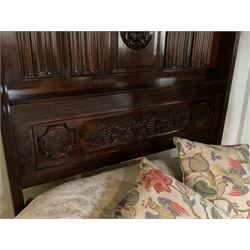 Mid to late 20th century mahogany 5’ Kingsize four poster bed, panelled canopy with dentil and fluted frieze, two turned baluster front supports carved with grape vine and leaves, linen fold panelled back with central rose carving, monogrammed sides ‘A’ and ‘R’, together with mattress 