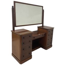 Victorian mahogany twin pedestal dressing table, one adjustable mirror, fitted with one long and eight short drawers, raised on a plinth base with recessed castors 