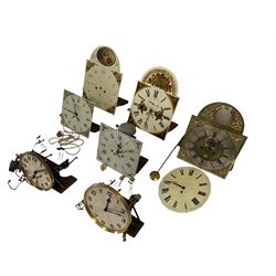 Five long case movements and dials, one fusee movement, dial and pendulum and two weight driven chiming movements