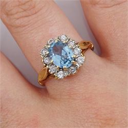 9ct gold blue topaz and cubic zirconia cluster ring, hallmarked
