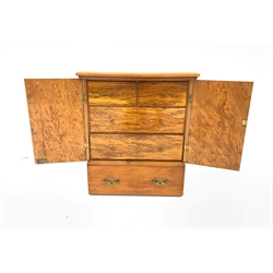 Satin walnut collectors chest, the elm interior fitted with two long and two short drawers enclosed by fielded panel doors with drawer under 51cm x 60cm x 33cm