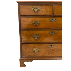 Georgian walnut walnut chest, the figured top with moulded edge, fitted with two short and three long drawers, on bracket feet
