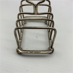 Edwardian silver four division toast rack with integral stand London 1901 Maker William Hutton and a pair of small silver four division toast racks Sheffield 1911 Maker Atkin Bros. 8.2oz